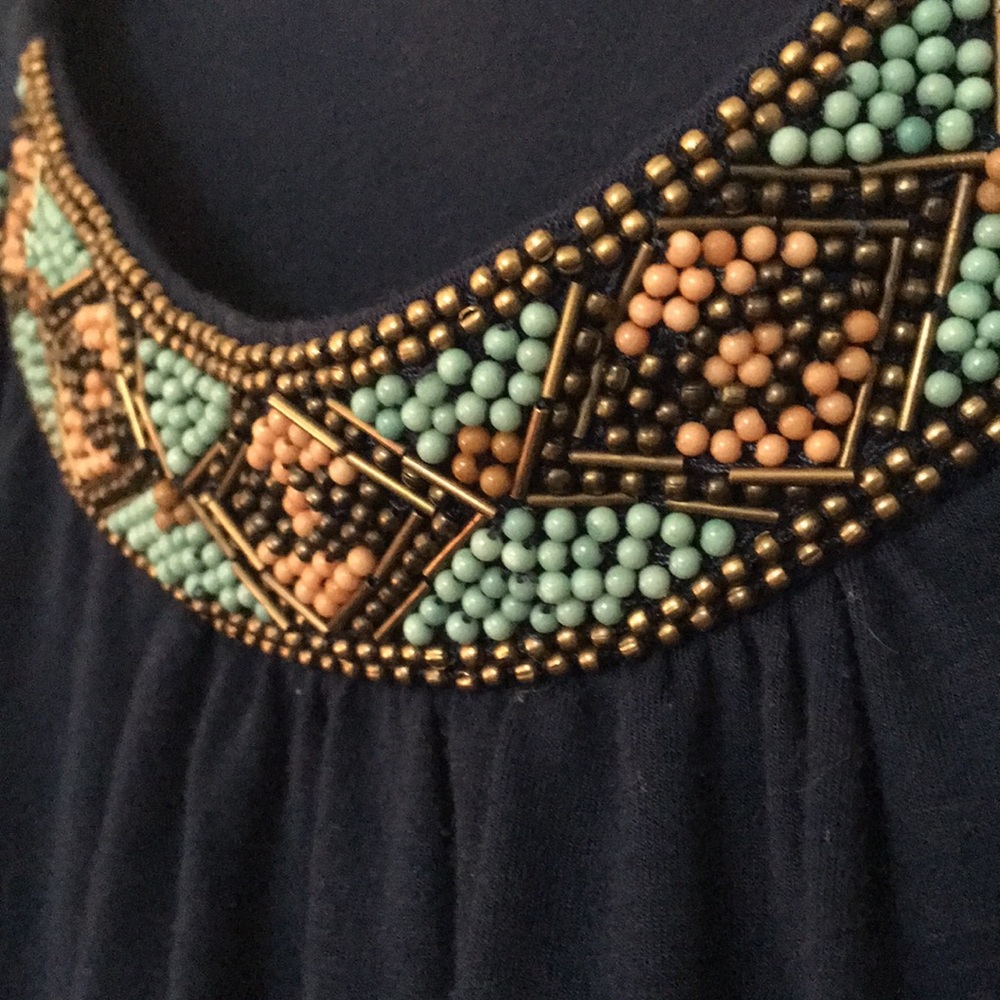 Sleeveless embellished tunic